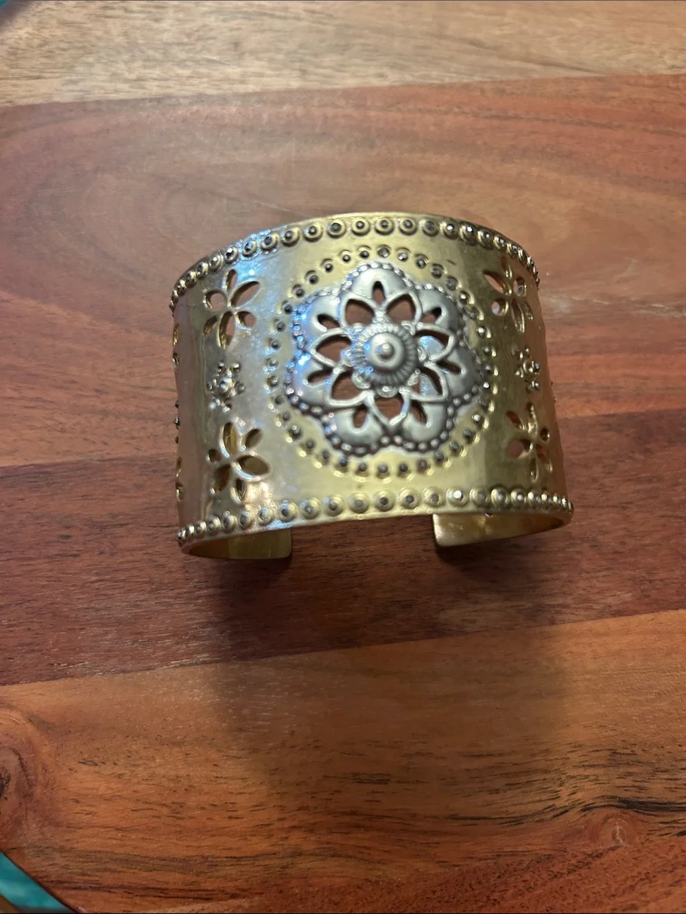 Lucky gold-tone floral cutout cuff bracelet intricate medallion center